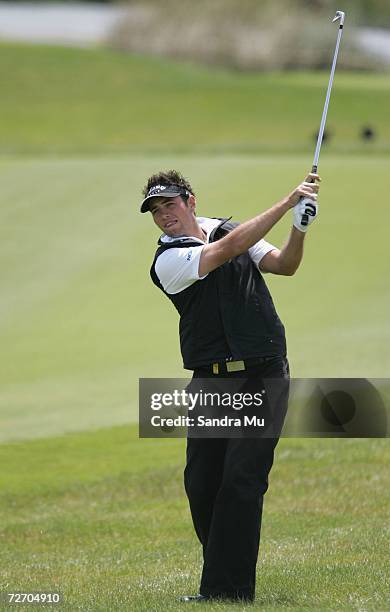 Nick Dougherty of England plays the ball on the 9th hole during the final round of the New Zealand Open at Gulf Harbour Country Club on the...