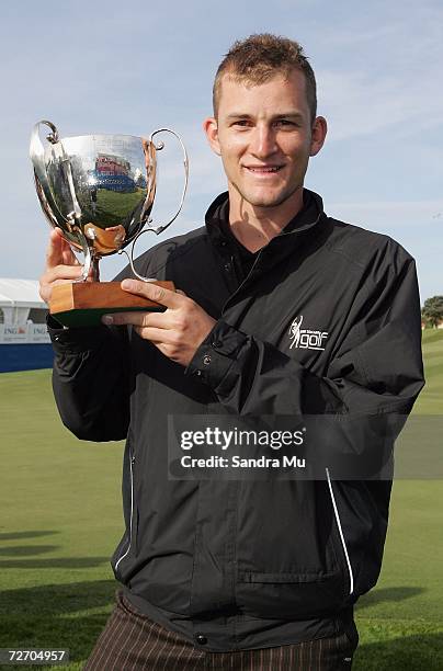 James Gill of Hamilton holds the Bledisloe Cup for leading New Zealand Amateur which he shared with Troy Ropiha of New Plymouth during the New...