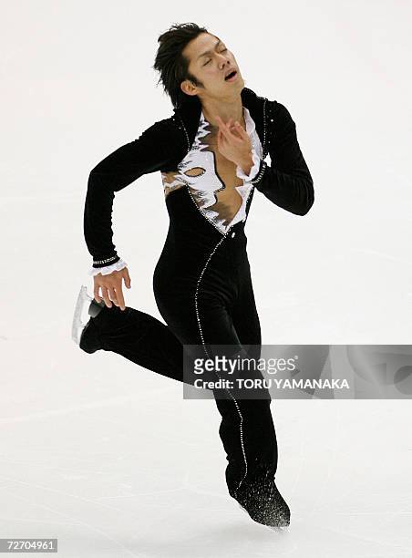 Japanese skater Daisuke Takahashi performs during the free skating of men's event in the NHK Trophy Figure Skating competition in Nagano, central...