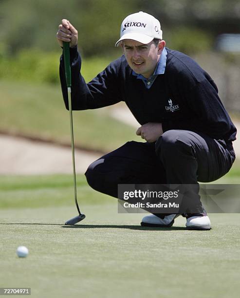 Peter Lawrie of Ireland lines up a putt on the 6th hole during the final round of the New Zealand Open at Gulf Harbour Country Club on the...