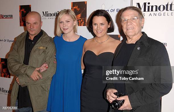 Russell Young, Kirsten Dunst, Jennifer Howell and Henry Diltz pose at The Art of 2 - Elysium's annual art show benefit, at the Minotti gallery...