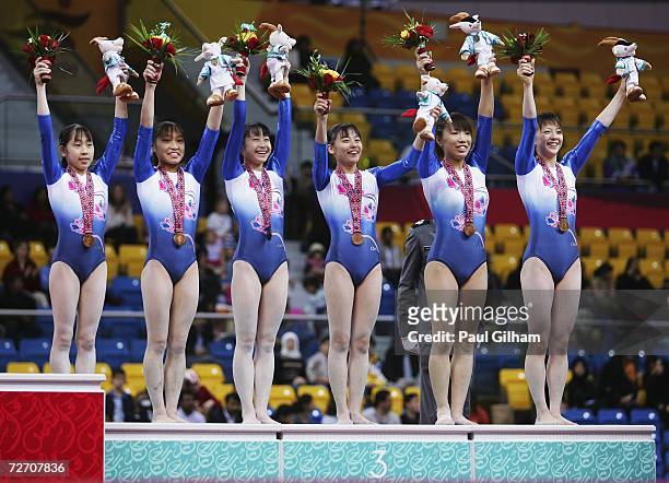 Mayu Kuroda, Kyoko Oshima, Miki Uemura, Erika Mizoguchi, Manami Ishizaka and Ayaka Sahara of Japan receive their Bronze Medals after the Women's...