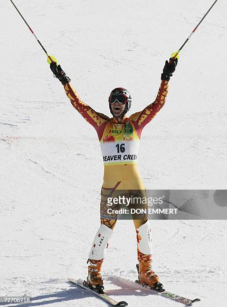 Michael Janyk of Canada raises his arms in celebration after finishing second in the men's World Cup Alpine slalom 3 December, 2006 in Beaver Creek,...