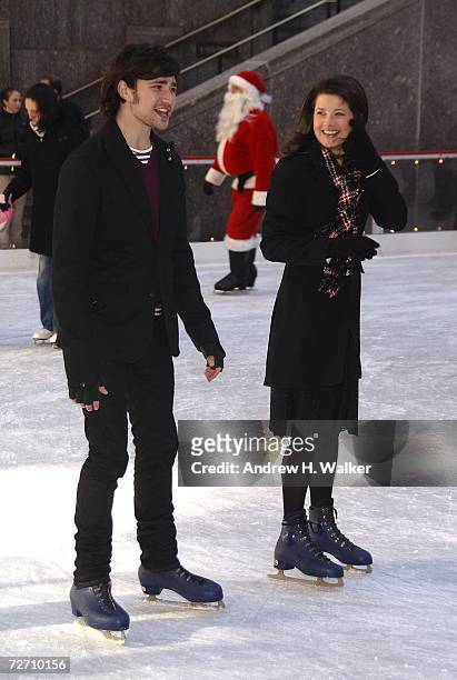 Actors Matt Dallas and Daphne Zuniga skate at the Rockefeller Center Ice Rink during the ABC Family 25 Days Of Christmas Winter Wonderland Event...