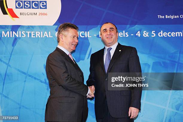 Belgium's Minister of Foreign Affairs Karel De Gucht shakes hands with his Azeri counterpart Elmar Mammadyarov 04 December 2006 during the working...