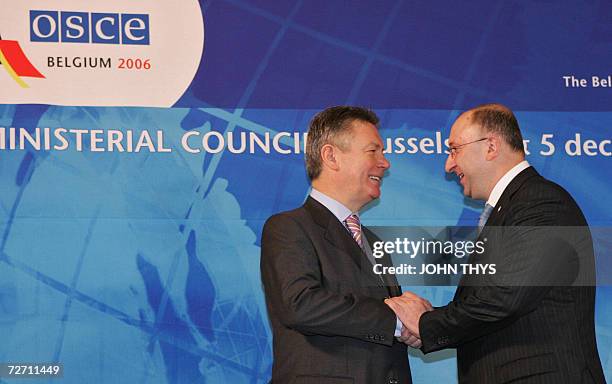 Belgium's Minister of Foreign Affairs Karel De Gucht shakes hands with his Georgian counterpart Gela Bejuashvili 04 December 2006 during the first...