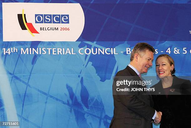 Belgium's Minister of Foreign Affairs Karel De Gucht greets EU external relations Commissioner Benita Ferrero-Waldner prior a working session of the...