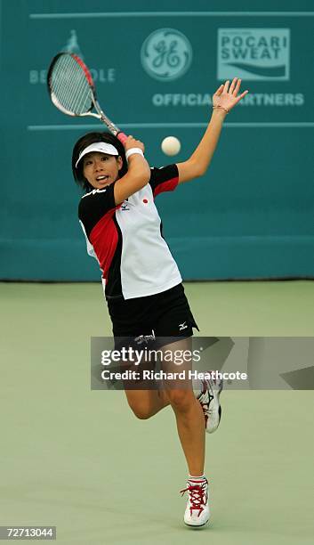 Harumi Gyokusen of Japan returns the ball during her match with Tsuneo Takagawa against Ji Eun Kim and Hyu Hwan We of Korea in the Mixed Doubles Soft...