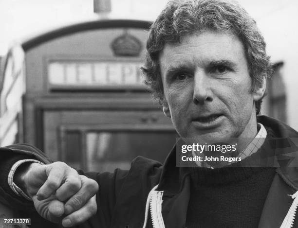 Art cirtic and historian Brian Sewell standing outside a telephone box, 20th November 1979. Sewell uses an outside line as he claims his phones are...