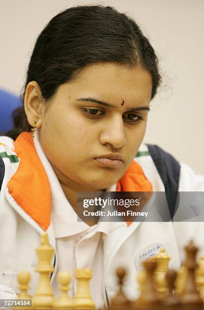 Humpy Koneru of India works out her next move in the Women's Rapid Swiss Chess Round 9 match at the Al Dana Indoor Hall during the 15th Asian Games...