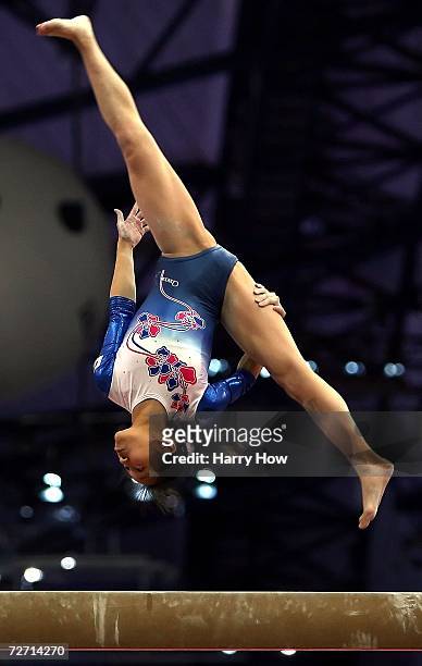 Miki Uemura of Japan competes on the balance beam during the Women's Individual All-Around Final at the 15th Asian Games Doha 2006 at Aspire Hall on...