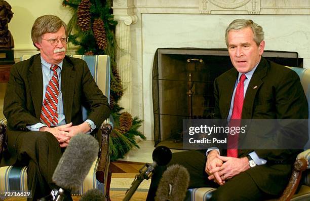 President George W. Bush and Ambassador to the UN John Bolton meet in the Oval Office of the White House December 4, 2006 in Washington, DC. Bush...