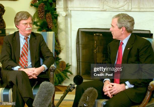 President George W. Bush and Ambassador to the UN John Bolton meet in the Oval Office of the White House December 4, 2006 in Washington, DC. Bush...