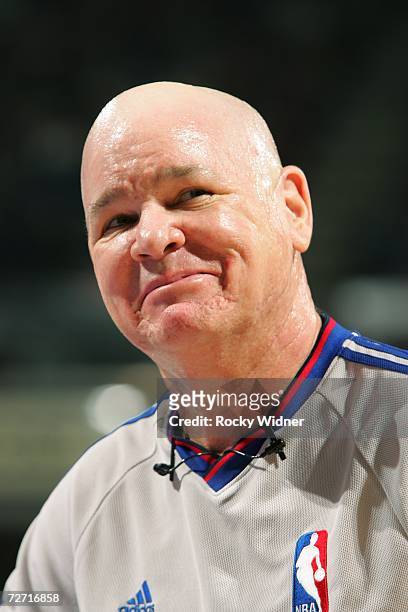 Referee Joe Crawford cracks a smile during the game between the San Antonio Spurs and the Sacramento Kings at Arco Arena on November 19, 2006 in...