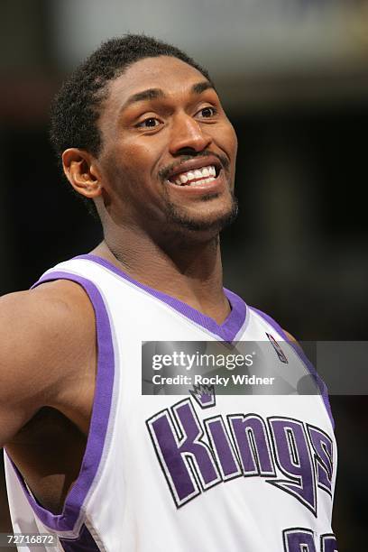 Ron Artest of the Sacramento Kings cracks a smile during the game against the San Antonio Spurs at Arco Arena on November 19, 2006 in Sacramento,...