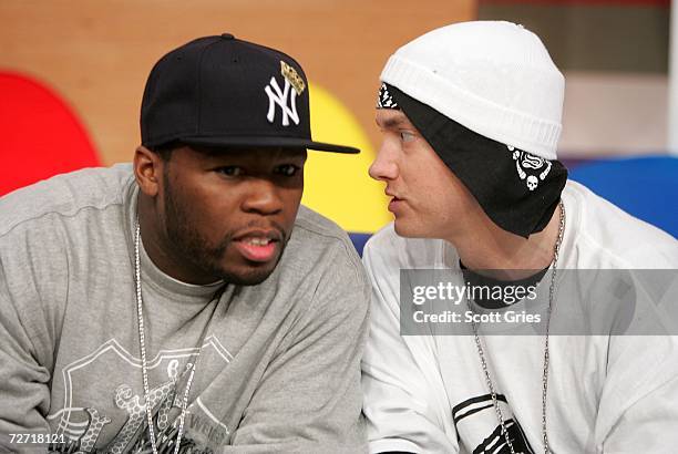 Rappers 50 Cent and Eminem appear onstage during BET's 106 & Park December 4, 2006 in New York City.