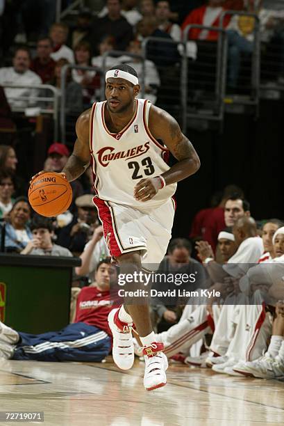 LeBron James of the Cleveland Cavaliers drives against the Memphis Grizzlies during the game at Quicken Loans Arena on November 21, 2006 in...