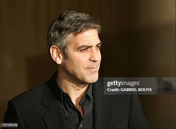 Hollywood, UNITED STATES: US actor George Clooney arrives for the premiere of "The Good German" in Hollywood, 04 December 2006. Based on the novel by...