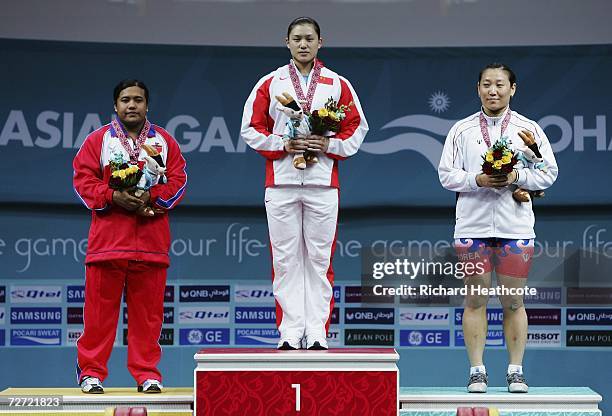 Cao Lei of China receives gold medal, Mya Sanda Oo of Myanmar receives her silver medal and Kim Soon Hee of the Republic of Korea receives her bronze...