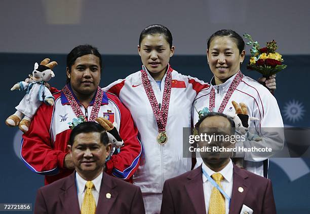 Cao Lei of China receives gold medal, Mya Sanda Oo of Myanmar receives her silver medal and Kim Soon Hee of the Republic of Korea receives her bronze...