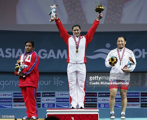 Cao Lei of China receives gold medal, Mya Sanda Oo of Myanmar receives her silver medal and Kim Soon Hee of the Republic of Korea receives her bronze...