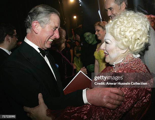 : Prince Charles, Prince of Wales meets entertainers backstage at the Royal Variety Performance in London, England.