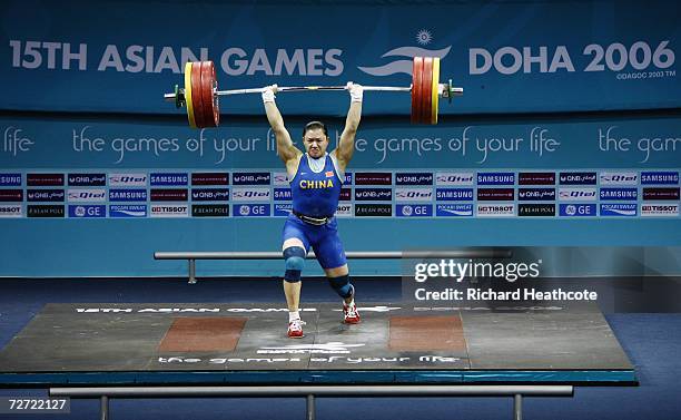 Cao Lei of China competes in the Women's 75kg Weightlifting Group A Final during the 15th Asian Games Doha 2006 at the Al-Dana Banquet Hall on...