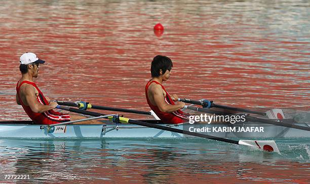Takehiro Kubo and Yoshimichi Nishimura of Japan compete against Lok Kwan Hoi and Leung Chun Shek in the semifinals of the men's Double Sculls at the...