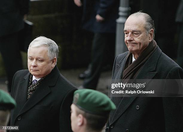 French President Jacques Chirac and Polish President Lech Kaczynski pace of the guard off honour on December 5, 2006 in Mettlach, Germany. During...