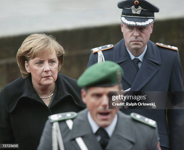 German Chancellor Angela Merkel attends the Weimar Triangle Summit on December 5, 2006 in Mettlach, Germany. Merkel, French President Jacques Chirac...