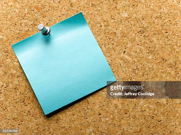 blue adhesive note pinned to notice board, close-up - postit stock pictures, royalty-free photos & images