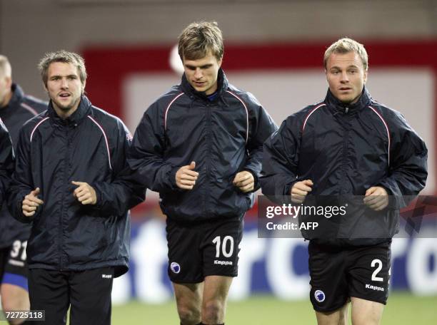 Michael Silberbauer, Jesper Gronkjaer and Lars Jacobsen of FC Copenhagen during a training 05 December 2006 at Copenhagen's Parken Stadium, on the...