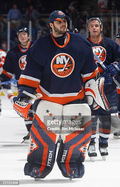 Goaltender Rick DiPietro of the New York Islanders looks on after the game against the Philadelphia Flyers on November 30, 2006 at Nassau Coliseum in...