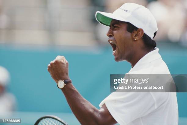 Indian tennis player Leander Paes competes for the India team to reach the finals and win the bronze medal in the Men's singles tennis event at Stone...
