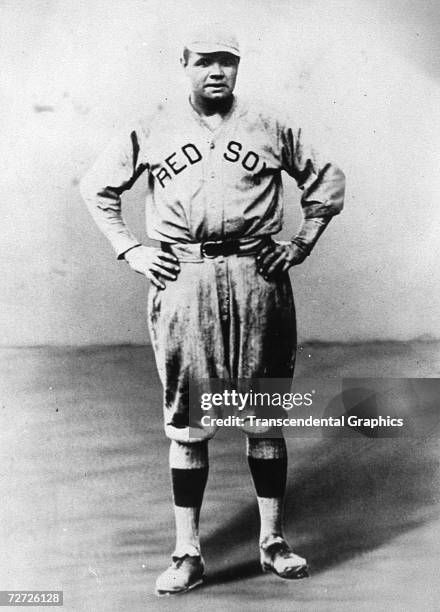 Babe Ruth poses for a portrait in his Boston Red Sox uniform in 1918.