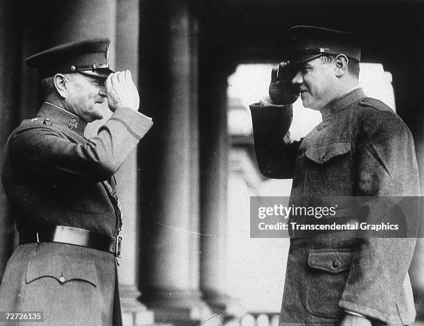 Babe Ruth, member of the 104th Field Artillery of the New York National Guard salutes General John J. Pershing in Washington, D.C., June of 1924.