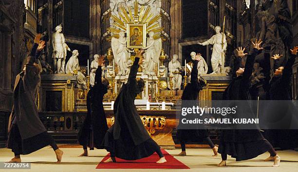 Dancers perform during a Requiem mass at Vienna's St. Michael's Church, 05 December 2006, where Wolfgang Amadeus Mozart's "Requiem" was first...