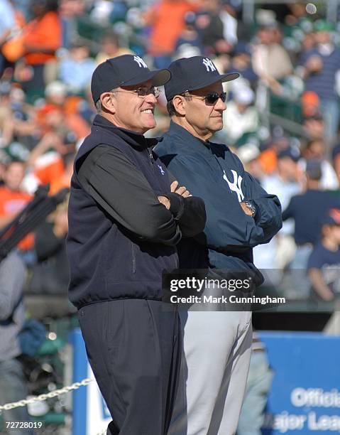Former New York City Mayor Rudy Giuliani and New York Yankees Manager Joe Torre talk during pre-game of Game Four of the 2006 American League...