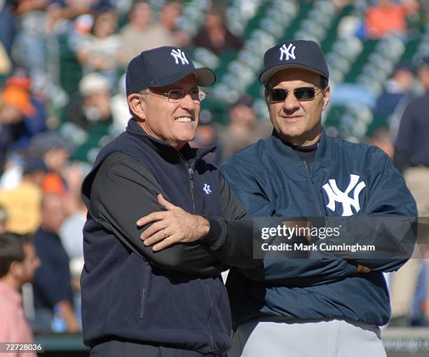 Former New York City Mayor Rudy Giuliani and New York Yankees Manager Joe Torre talk during pre-game of Game Four of the 2006 American League...