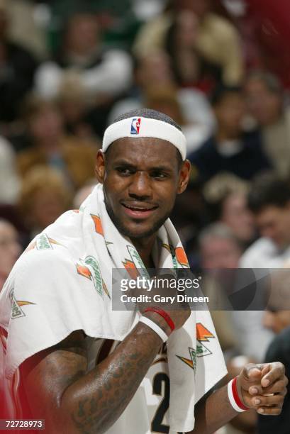 LeBron James of the Cleveland Cavaliers watches the game against the Minnesota Timberwolves on November 17, 2006 at the Quicken Loans Arena in...
