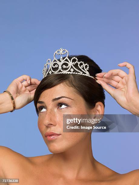 young woman wearing a tiara - woman tiara stock pictures, royalty-free photos & images