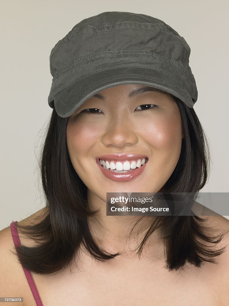 Korean woman wearing a cap