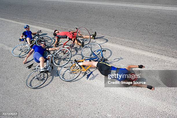 cyclists after crash - camisola de ciclismo imagens e fotografias de stock