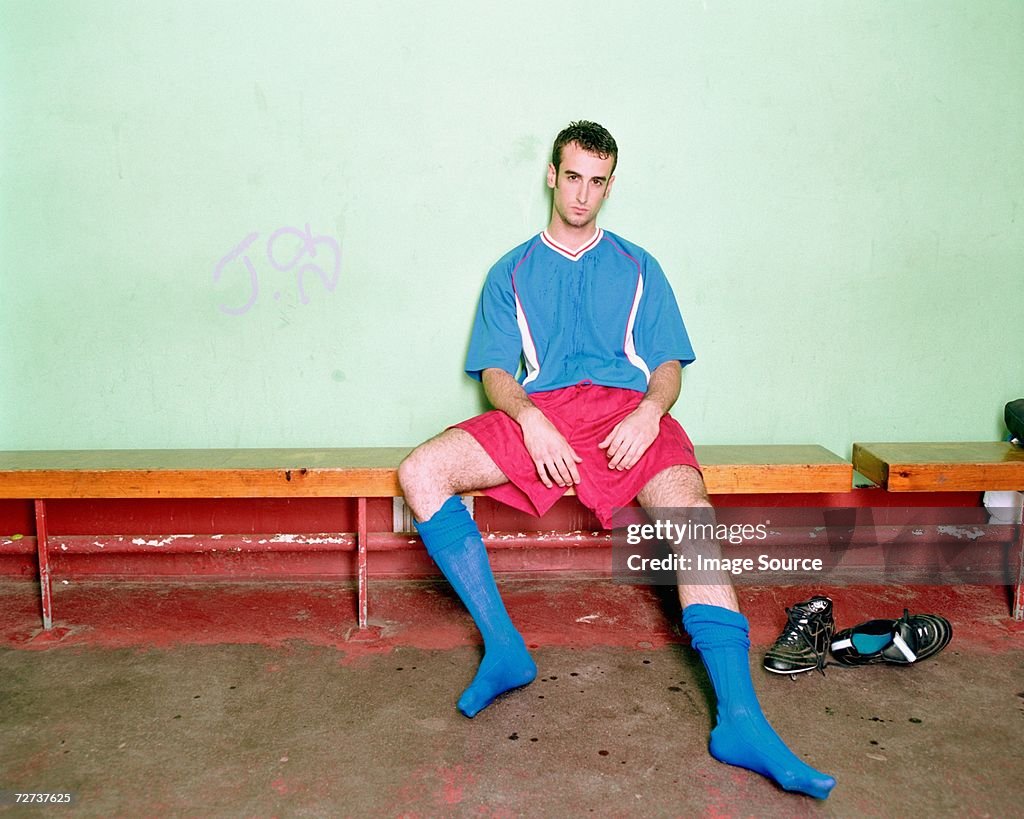 Soccer player in changing room