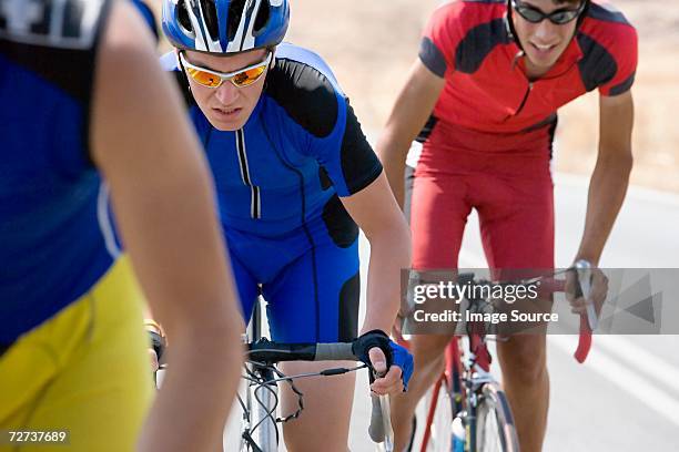 cycling race - triathlon cycling stock pictures, royalty-free photos & images