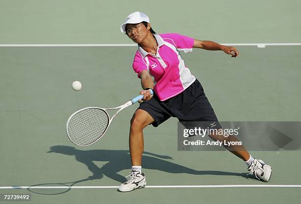 Chiang Wan Chi of Chinese Taipei plays a shot in her match over Kim Ji Eun of the Republic of Korea in the Women's Soft Tennis Singles semi final...