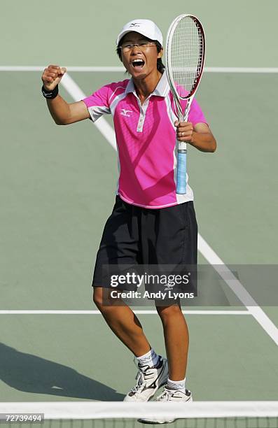 Chiang Wan Chi of Chinese Taipei celebrates her victory over Kim Ji Eun of the Republic of Korea in the Women's Soft Tennis Singles semi final match...