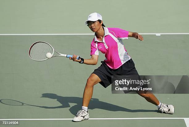 Chiang Wan Chi of Chinese Taipei plays a shot in her match over Kim Ji Eun of the Republic of Korea in the Women's Soft Tennis Singles semi final...