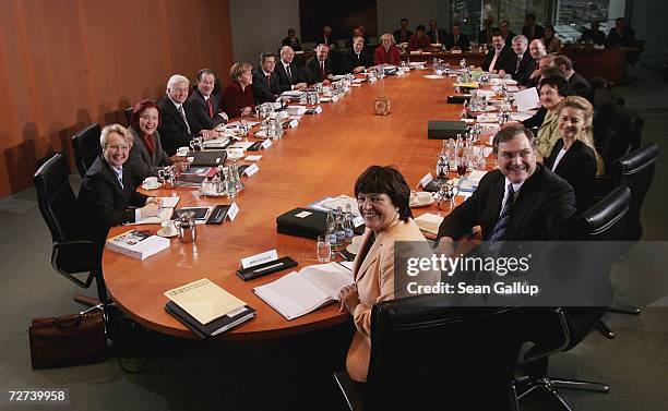 The complete German government cabinet, including Education Minister Annette Schavan, Development Minister Heidemarie Wieczorek-Zeul, Foreign...