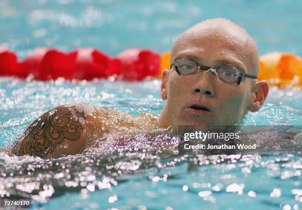 Michael Klim looks on in the warm up pool prior to competition during day four of the Australian Championships at the Chandler Aquatic Centre on...